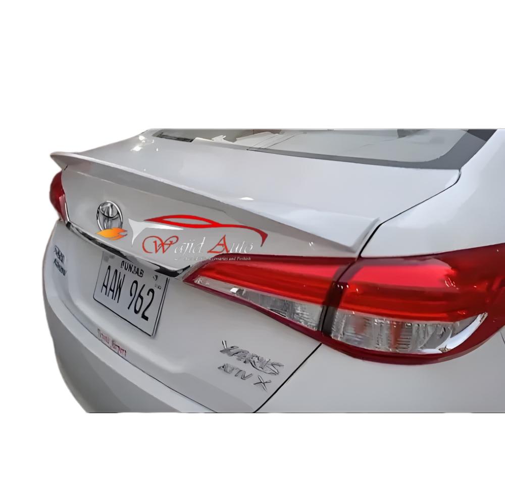 Toyota yaris duck tail spoiler in white colour and many more colours.Made in fiber glass