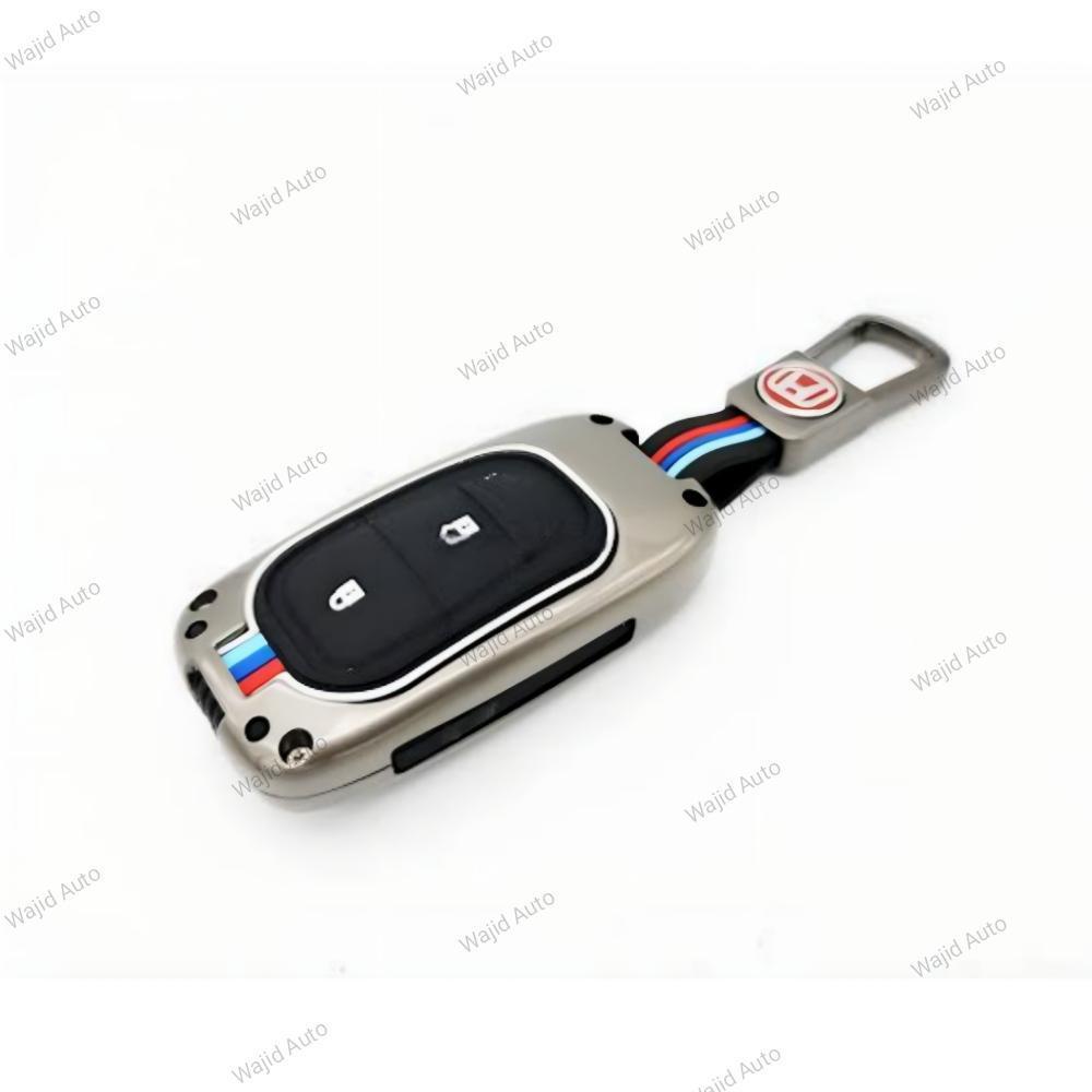 Black rubber and metal car remote cover